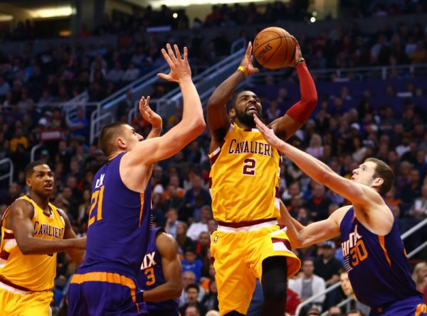 kyrie_irving_drives_to_the_hoop_for_the_cleveland__5682139902.jpg
